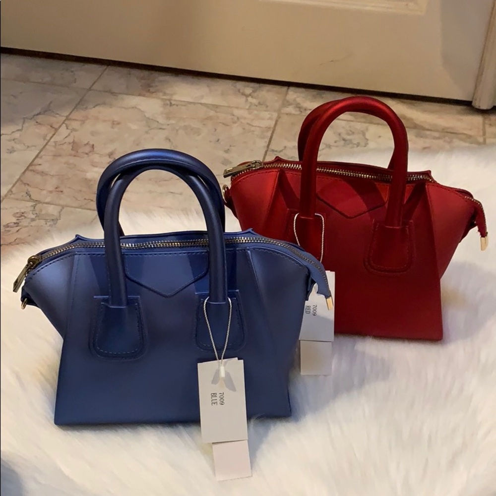 2/$100 Handheld crossbody